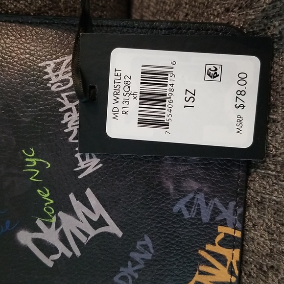 Nwt DKNY medium black graffiti wristlet. Retails $78 - Picture 9 of 9